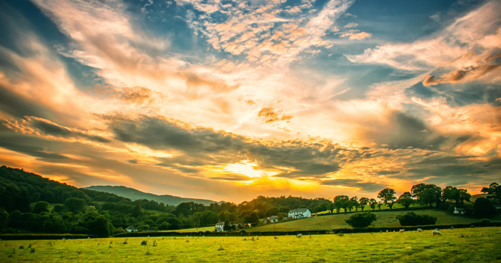 image of farm and sunset