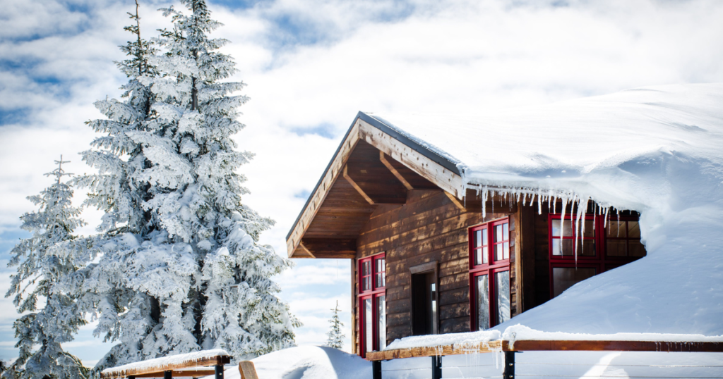 rustic cabin in snow